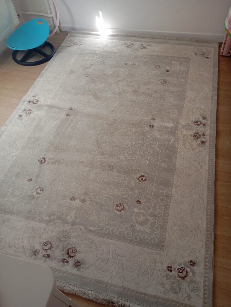 Tapis blanc cassé laine