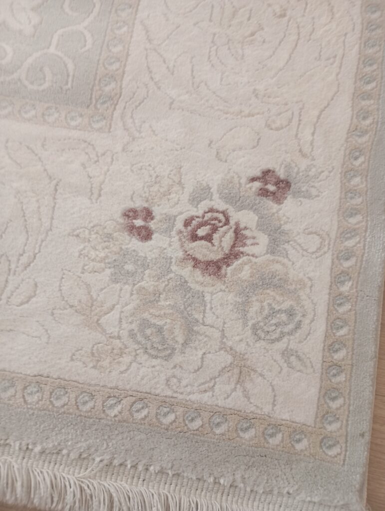 Tapis blanc cassé laine